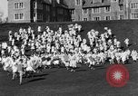 Image of annual hoop roll Wellesley Massachusetts USA, 1931, second 24 stock footage video 65675070441