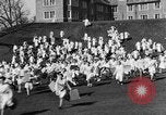 Image of annual hoop roll Wellesley Massachusetts USA, 1931, second 26 stock footage video 65675070441