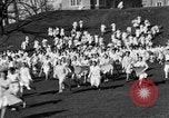 Image of annual hoop roll Wellesley Massachusetts USA, 1931, second 27 stock footage video 65675070441