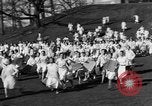 Image of annual hoop roll Wellesley Massachusetts USA, 1931, second 28 stock footage video 65675070441