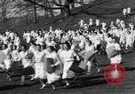 Image of annual hoop roll Wellesley Massachusetts USA, 1931, second 29 stock footage video 65675070441
