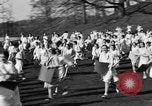 Image of annual hoop roll Wellesley Massachusetts USA, 1931, second 30 stock footage video 65675070441