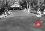 Image of annual hoop roll Wellesley Massachusetts USA, 1931, second 32 stock footage video 65675070441