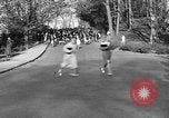 Image of annual hoop roll Wellesley Massachusetts USA, 1931, second 37 stock footage video 65675070441