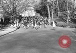 Image of annual hoop roll Wellesley Massachusetts USA, 1931, second 41 stock footage video 65675070441
