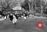 Image of annual hoop roll Wellesley Massachusetts USA, 1931, second 44 stock footage video 65675070441
