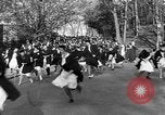 Image of annual hoop roll Wellesley Massachusetts USA, 1931, second 47 stock footage video 65675070441
