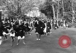 Image of annual hoop roll Wellesley Massachusetts USA, 1931, second 48 stock footage video 65675070441