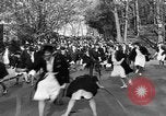 Image of annual hoop roll Wellesley Massachusetts USA, 1931, second 50 stock footage video 65675070441