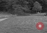 Standbild US-Truppen verschieben durch Dörfer und Unter-Diessen Oberdiessen Bava Unter-Diessen Deutschland, 1945, aus Sekunde 3 historischem Filmmaterial Videoclip 65675070469