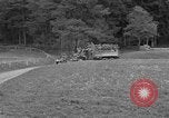 Standbild US-Truppen verschieben durch Dörfer und Unter-Diessen Oberdiessen Bava Unter-Diessen Deutschland, 1945, aus Sekunde 7 historischem Filmmaterial Videoclip 65675070469