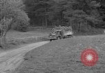 Standbild US-Truppen verschieben durch Dörfer und Unter-Diessen Oberdiessen Bava Unter-Diessen Deutschland, 1945, aus Sekunde 10 historischem Filmmaterial Videoclip 65675070469