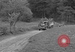 Standbild US-Truppen verschieben durch Dörfer und Unter-Diessen Oberdiessen Bava Unter-Diessen Deutschland, 1945, aus Sekunde 12 historischem Filmmaterial Videoclip 65675070469