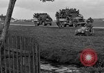 Standbild US-Truppen verschieben durch Dörfer und Unter-Diessen Oberdiessen Bava Unter-Diessen Deutschland, 1945, aus Sekunde 38 historischem Filmmaterial Videoclip 65675070469
