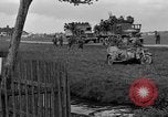 Standbild US-Truppen verschieben durch Dörfer und Unter-Diessen Oberdiessen Bava Unter-Diessen Deutschland, 1945, aus Sekunde 41 historischem Filmmaterial Videoclip 65675070469