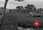 Standbild US-Truppen verschieben durch Dörfer und Unter-Diessen Oberdiessen Bava Unter-Diessen Deutschland, 1945, aus Sekunde 43 historischem Filmmaterial Videoclip 65675070469