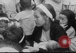 Image of care and feeding Saigon Vietnam, 1968, second 1 stock footage video 65675070509