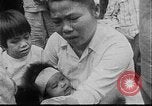 Image of care and feeding Saigon Vietnam, 1968, second 16 stock footage video 65675070509