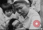 Image of care and feeding Saigon Vietnam, 1968, second 17 stock footage video 65675070509
