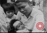 Image of care and feeding Saigon Vietnam, 1968, second 18 stock footage video 65675070509