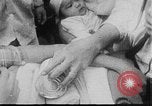 Image of care and feeding Saigon Vietnam, 1968, second 19 stock footage video 65675070509