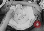 Image of care and feeding Saigon Vietnam, 1968, second 20 stock footage video 65675070509