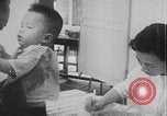 Image of care and feeding Saigon Vietnam, 1968, second 42 stock footage video 65675070509