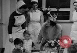 Image of sick children visited by King George VI London England United Kingdom, 1938, second 30 stock footage video 65675070524