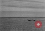 Image of wheat harvested by mule drawn combines United States USA, 1936, second 19 stock footage video 65675070601