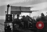 Image of wheat harvested by mule drawn combines United States USA, 1936, second 36 stock footage video 65675070601