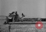Image of wheat harvested by mule drawn combines United States USA, 1936, second 44 stock footage video 65675070601