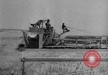 Image of wheat harvested by mule drawn combines United States USA, 1936, second 45 stock footage video 65675070601