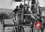 Image of wheat harvested by mule drawn combines United States USA, 1936, second 61 stock footage video 65675070601