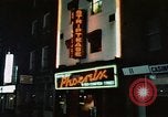 Standbild Soho 1960 Neon signs Soho London England United Kingdom, 1968, aus Sekunde 3 historischem Filmmaterial Videoclip 65675070675
