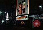 Standbild Soho 1960 Neon signs Soho London England United Kingdom, 1968, aus Sekunde 5 historischem Filmmaterial Videoclip 65675070675