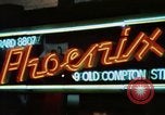 Standbild Soho 1960 Neon signs Soho London England United Kingdom, 1968, aus Sekunde 11 historischem Filmmaterial Videoclip 65675070675