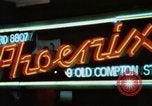 Standbild Soho 1960 Neon signs Soho London England United Kingdom, 1968, aus Sekunde 12 historischem Filmmaterial Videoclip 65675070675
