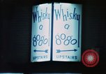 Standbild Whisky a Gogo Leuchtreklame Soho Soho London England United Kingdom, 1968, aus Sekunde 18 historischem Filmmaterial Videoclip 65675070676