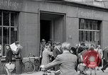 Image of first American newspaper Aachen Germany, 1945, second 8 stock footage video 65675070697