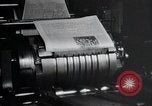 Image of first American newspaper Aachen Germany, 1945, second 44 stock footage video 65675070697