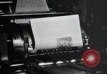 Image of first American newspaper Aachen Germany, 1945, second 45 stock footage video 65675070697
