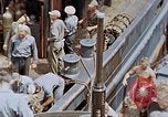 Image of Fighting fire on US Navy LST from kamikaze attack Pacific Theater, 1945, second 4 stock footage video 65675070702