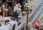 Image of Fighting fire on US Navy LST from kamikaze attack Pacific Theater, 1945, second 12 stock footage video 65675070702