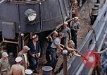 Image of Fighting fire on US Navy LST from kamikaze attack Pacific Theater, 1945, second 22 stock footage video 65675070702