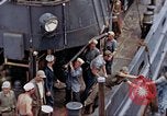 Image of Fighting fire on US Navy LST from kamikaze attack Pacific Theater, 1945, second 23 stock footage video 65675070702