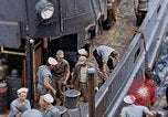 Image of Fighting fire on US Navy LST from kamikaze attack Pacific Theater, 1945, second 32 stock footage video 65675070702