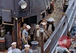 Image of Fighting fire on US Navy LST from kamikaze attack Pacific Theater, 1945, second 33 stock footage video 65675070702