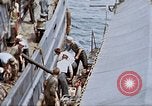 Image of Fighting fire on US Navy LST from kamikaze attack Pacific Theater, 1945, second 35 stock footage video 65675070702