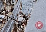Image of Fighting fire on US Navy LST from kamikaze attack Pacific Theater, 1945, second 36 stock footage video 65675070702