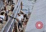 Image of Fighting fire on US Navy LST from kamikaze attack Pacific Theater, 1945, second 37 stock footage video 65675070702